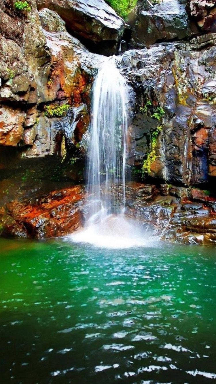 Spend A Day Exploring The Turquoise Waterfalls Of Lagoon Wallpaper