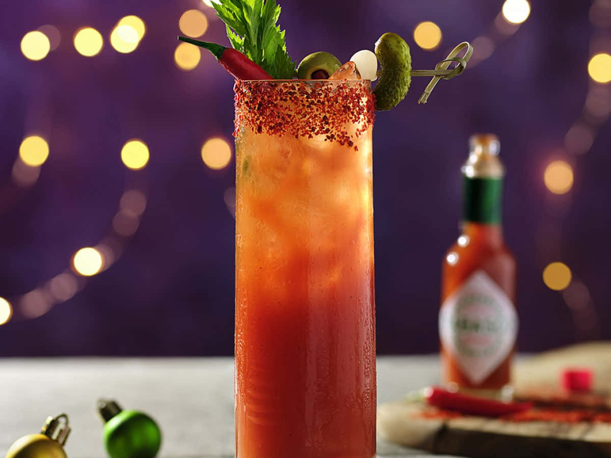 Spicy Bloody Mary Cocktail Garnished With Crisp Jalapenos. Wallpaper