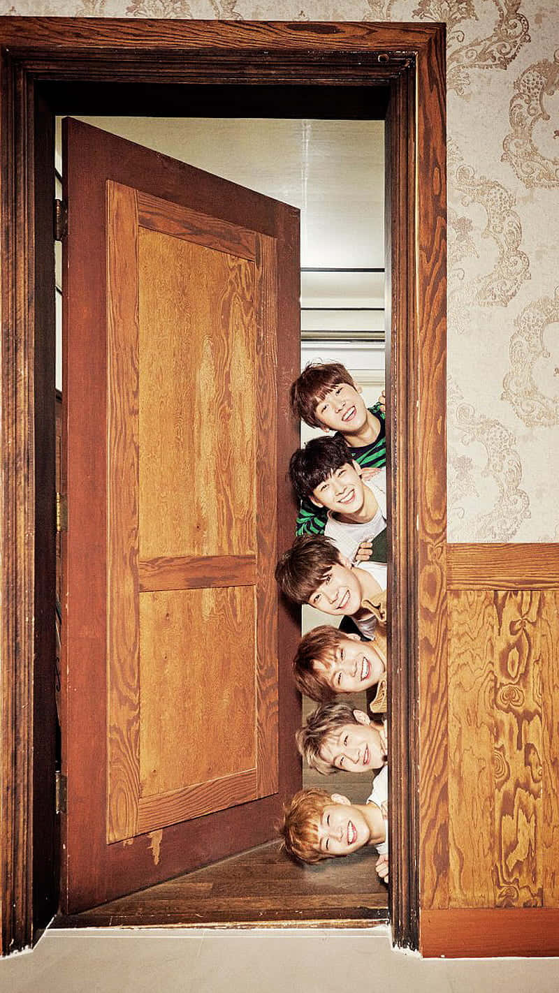 Stacked Smiles Doorway Wallpaper