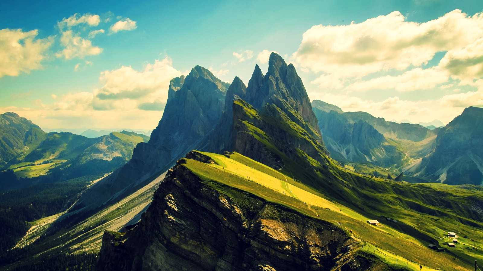 Standing Atop A Mountain Peak. Wallpaper