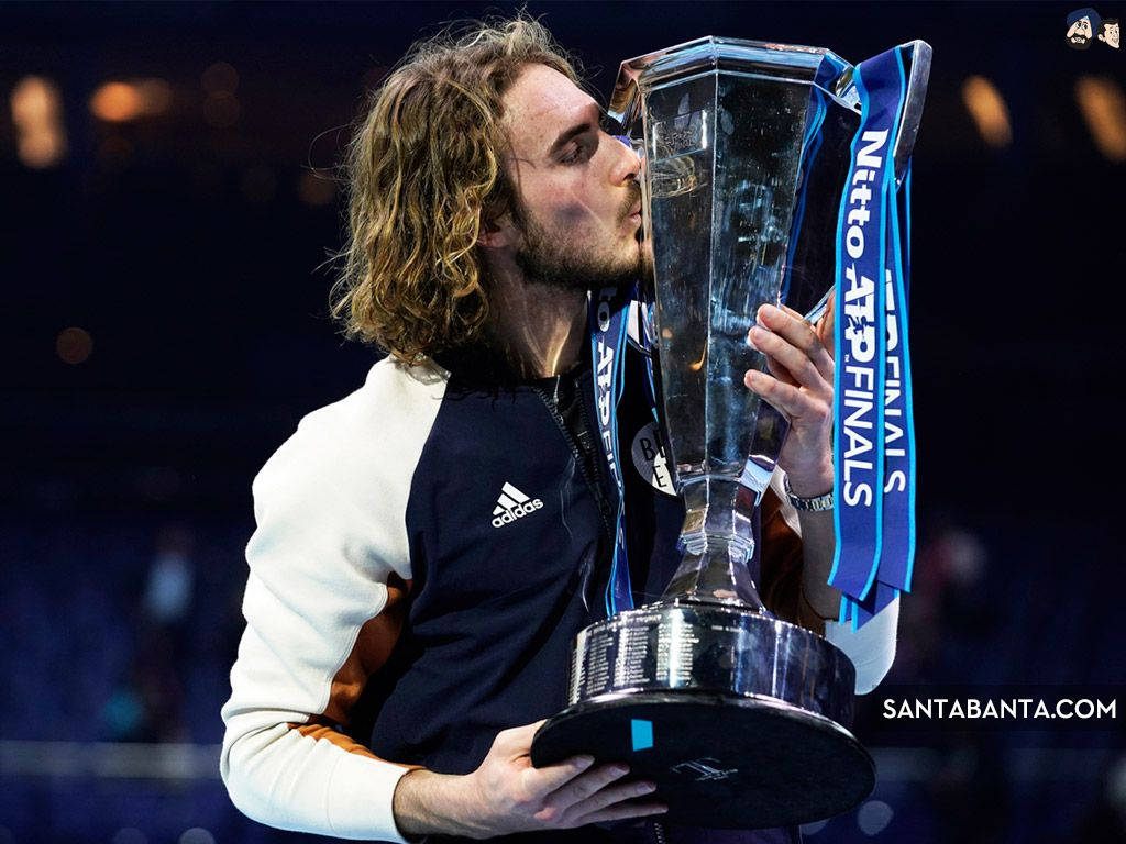 Stefanos Tsitsipas Kissing His Trophy Wallpaper