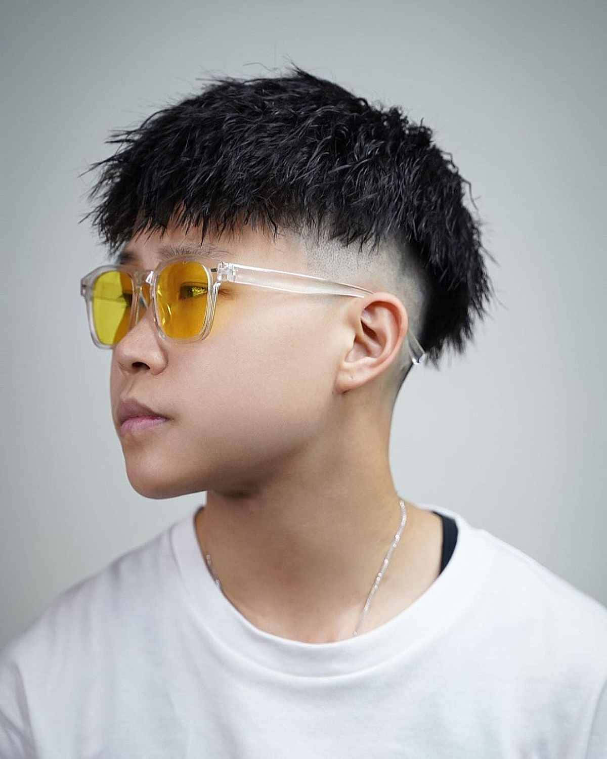 Stylish_ Teen_ Boy_with_ Yellow_ Sunglasses Wallpaper