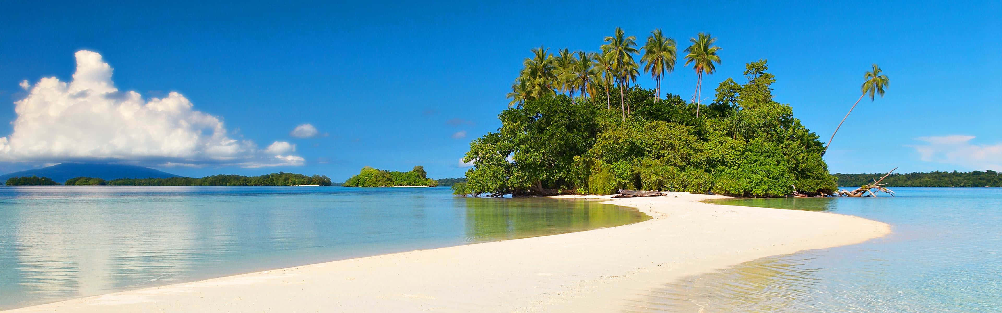 Sunset View Of A Paradise Beach Wallpaper