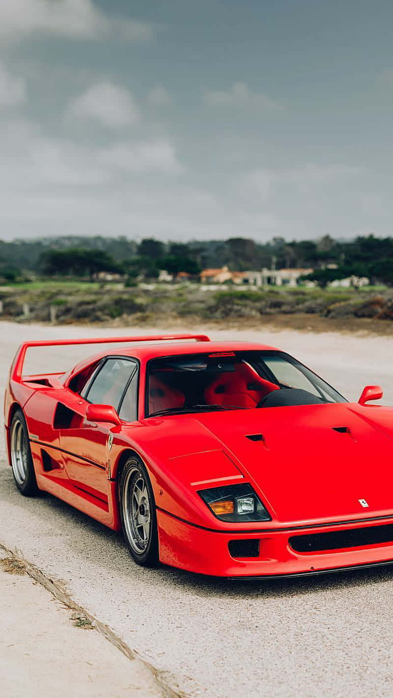 Take A Trip Back In Time With This Beautiful Vintage Ferrari Wallpaper