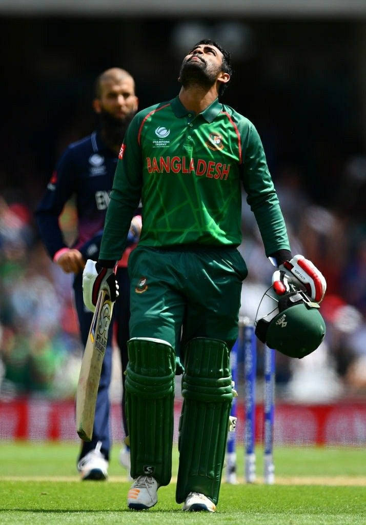 Tamim Iqbal Glancing Upwards In Confidence Wallpaper