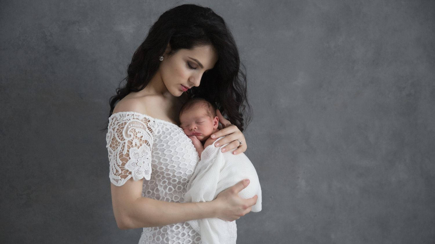 Tender Moments Between Mother And Baby Wallpaper