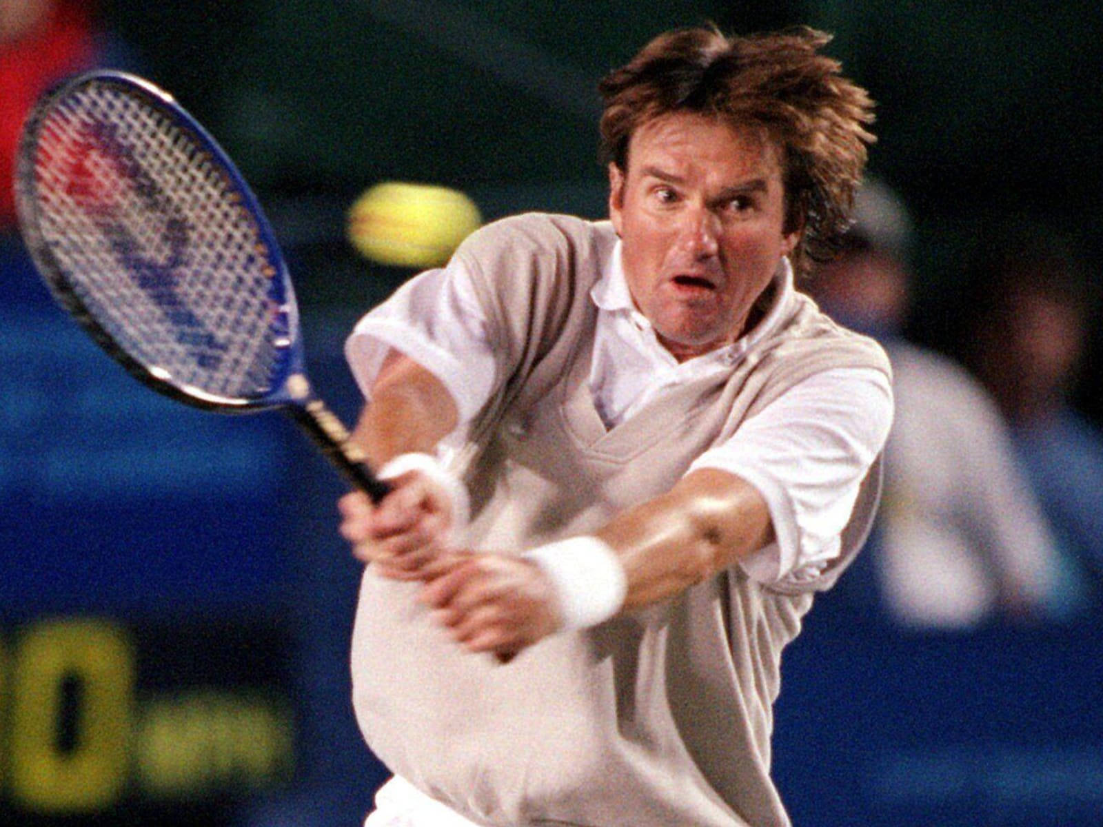 Tennis Legend Jimmy Connors In Action Wallpaper