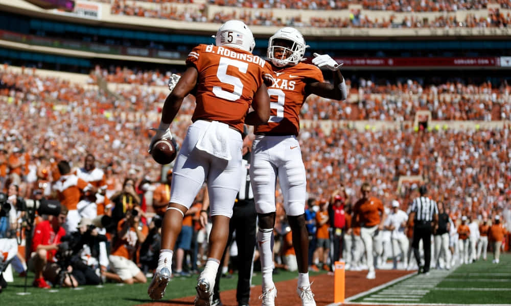 Texas Football Spreading Arms Wallpaper