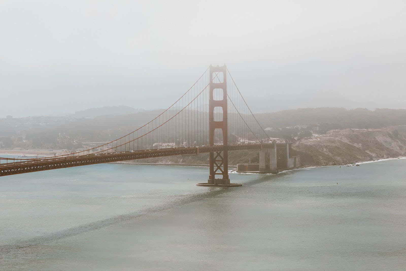 The Bright City Lights Of San Francisco, Shrouded In Fog Wallpaper