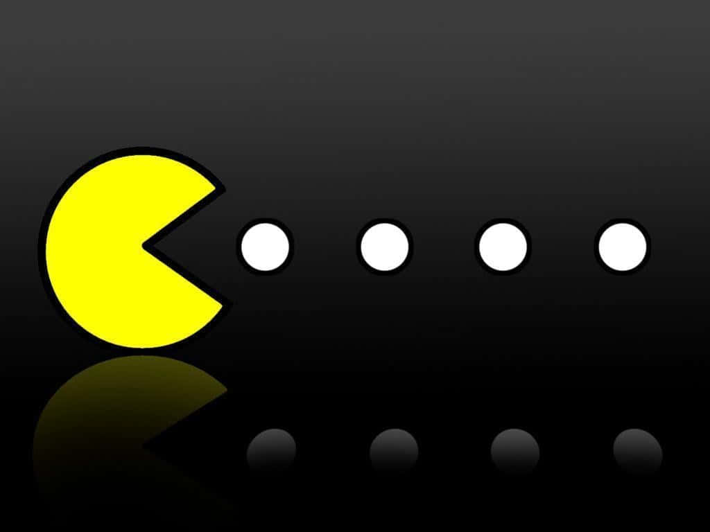 'the Classic Gaming Icon Pacman Takes The Spotlight!' Wallpaper