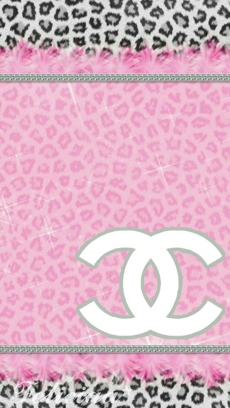 The Feminine And Elegant Pink Chanel Logo Wallpaper