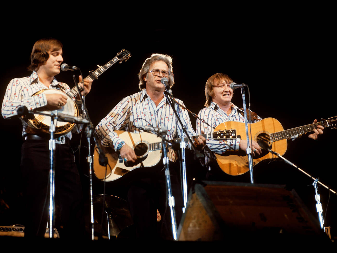 The Kingston Trio Performing In Madison Square Garden Wallpaper