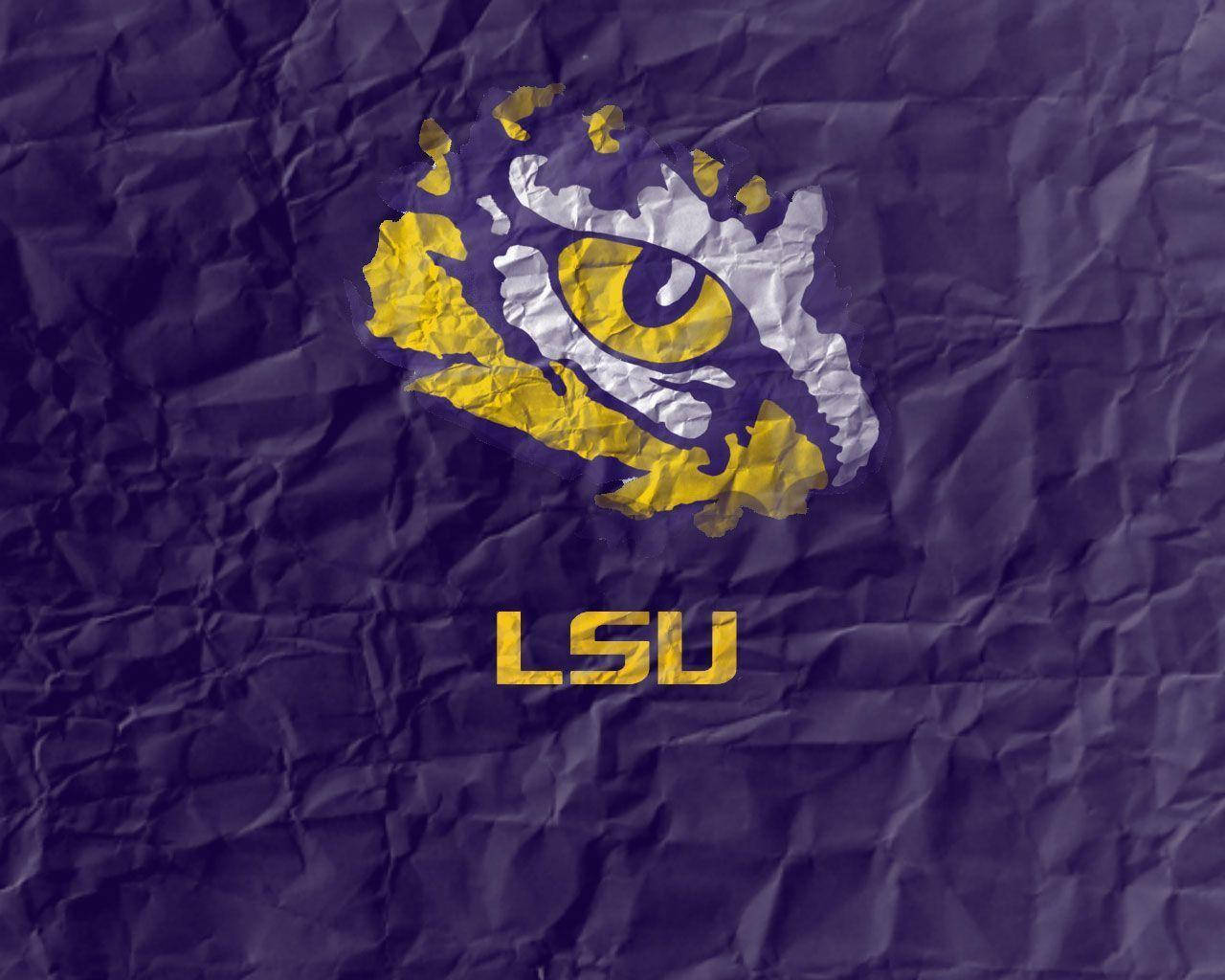 The Lsu Tigers Celebrating A Victory On The Field Wallpaper