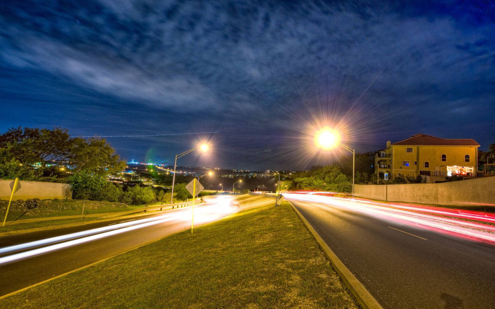 The Magnificence Of San Antonio's Road Lights At Night Wallpaper