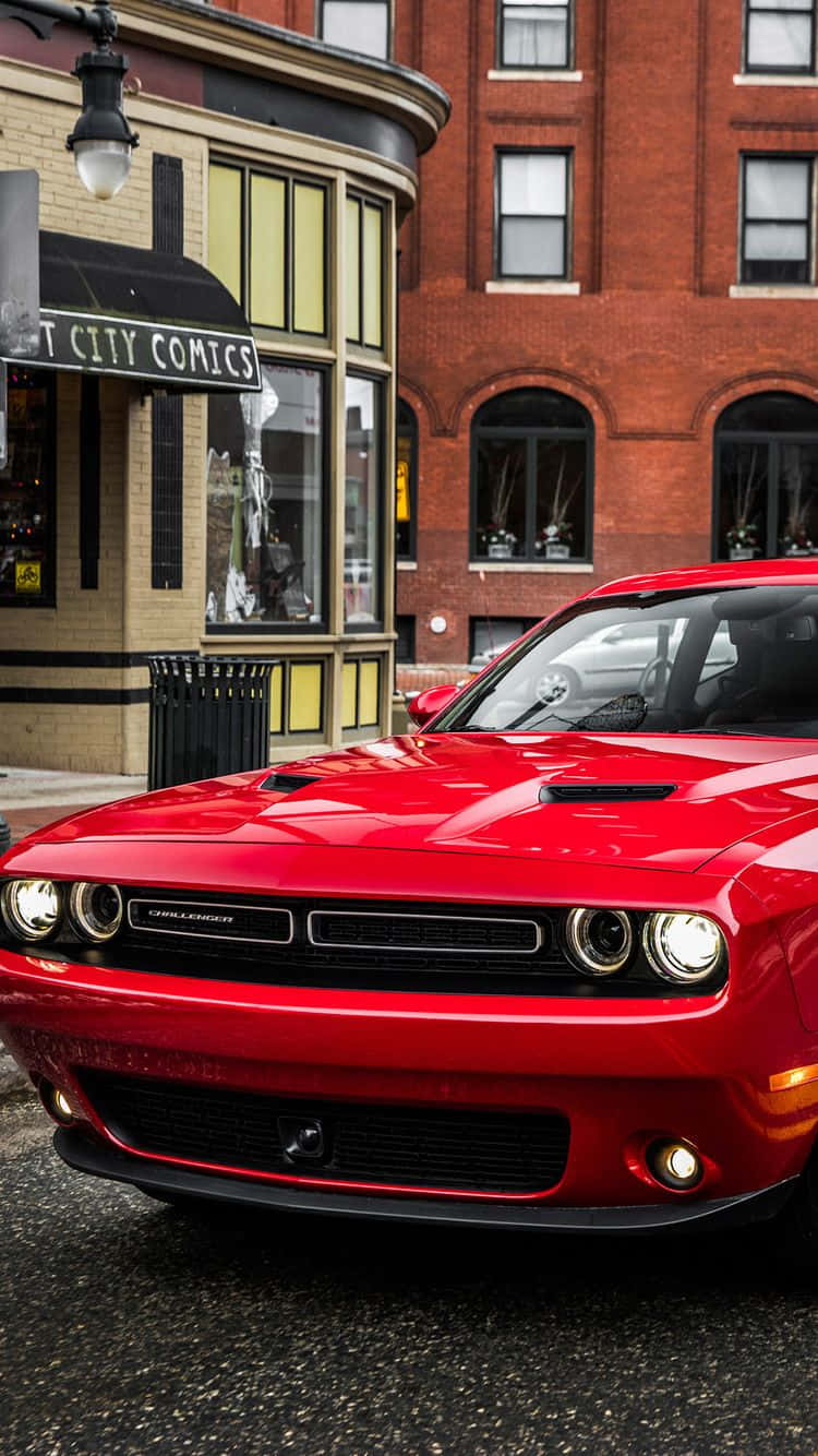 The Sleek And Stylish Look Of A Red Car In An Iphone Wallpaper