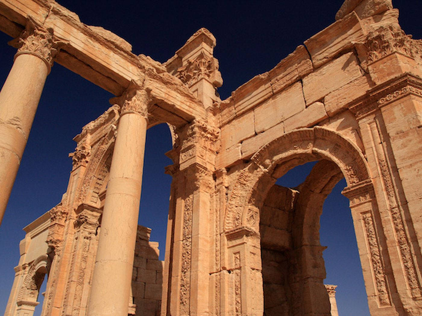 The Tall Sandstone Pillars In Palmyra Wallpaper