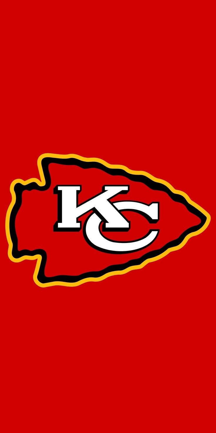 The Vibrant Logo Of Kansas City Chiefs Displayed On A Red Background. Wallpaper