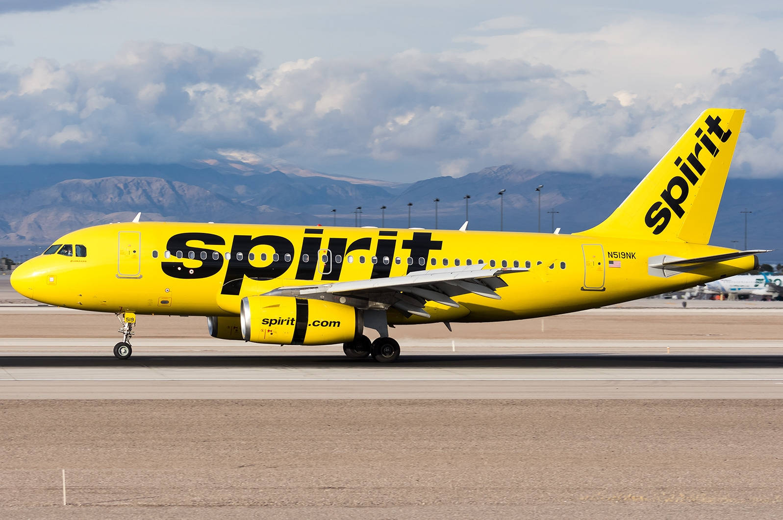 Thick Clouds Spirit Airlines Plane Wallpaper