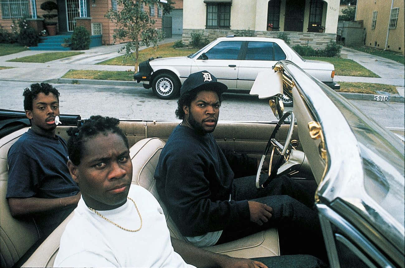 Three Boys Stand Atop A Hill In South Central Los Angeles In Boyz N The Hood Wallpaper