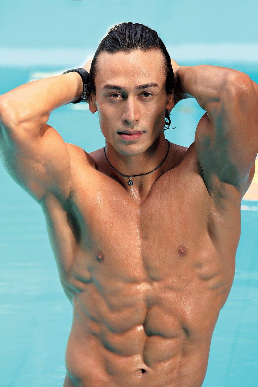 Tiger Shroff Body In The Pool Wallpaper