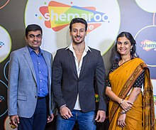 Tiger Shroff With Shemaroo Executives Wallpaper