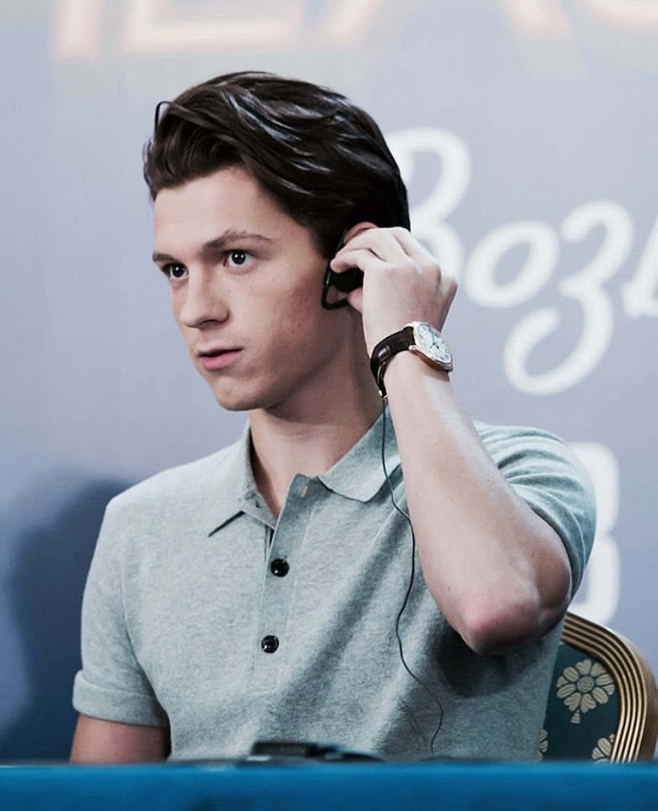 Tom Holland Debonair And Stylish Wallpaper