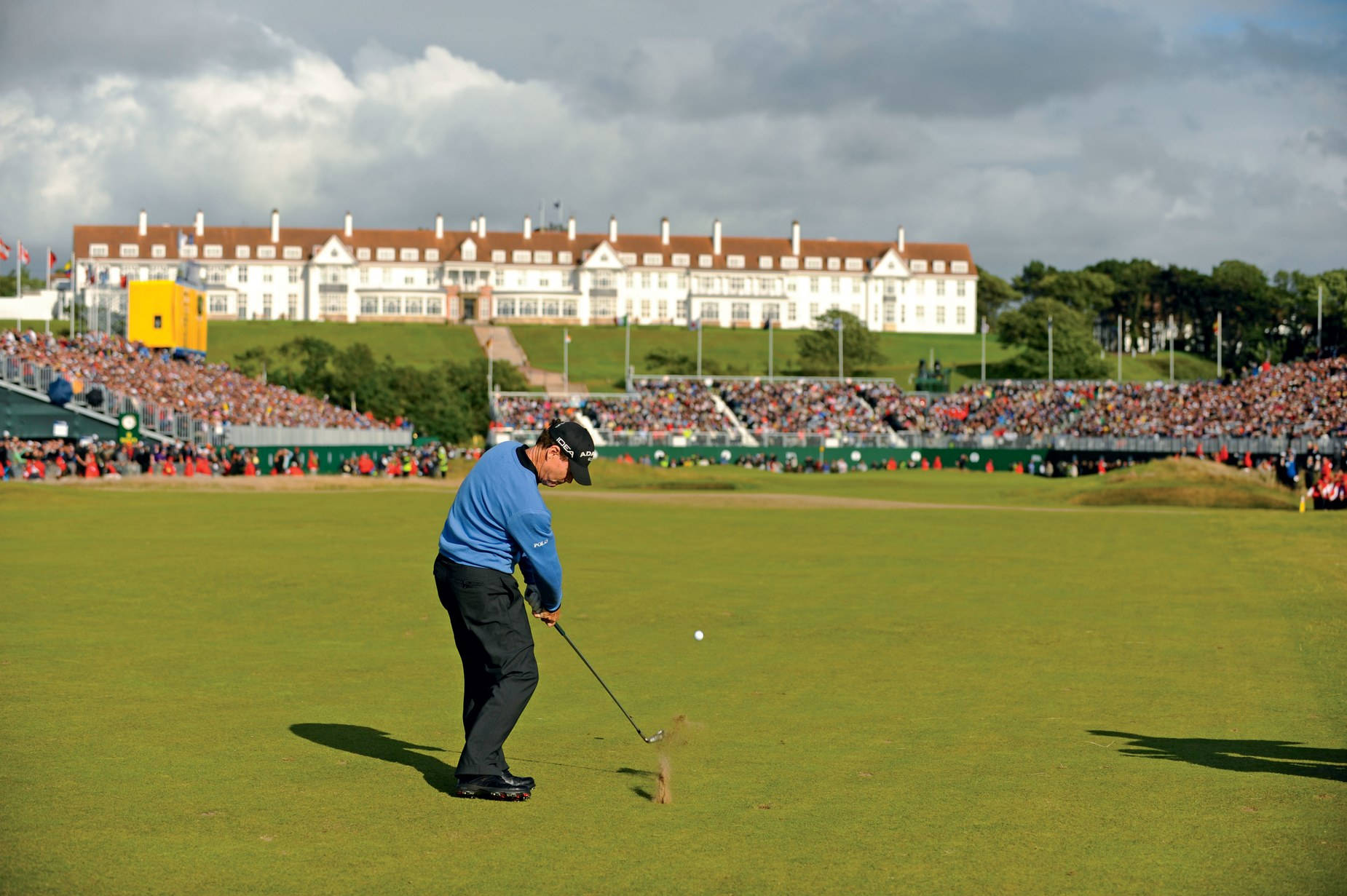 Tom Watson Hitting A Golf Shot Wallpaper