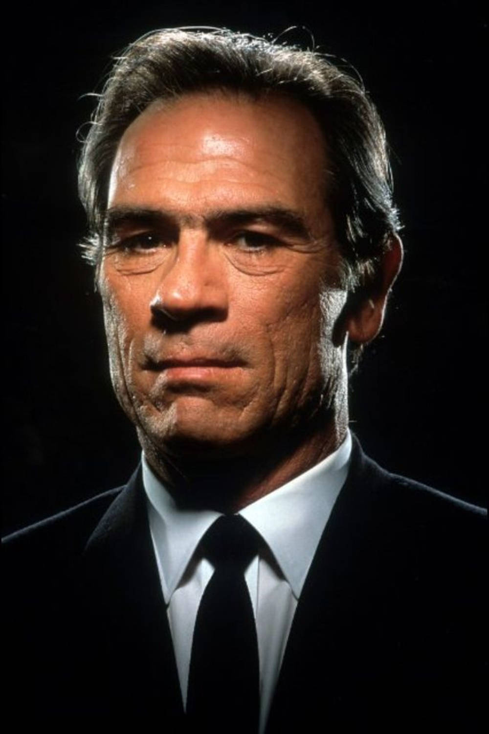 Tommy Lee Jones On A Dark Background Wallpaper