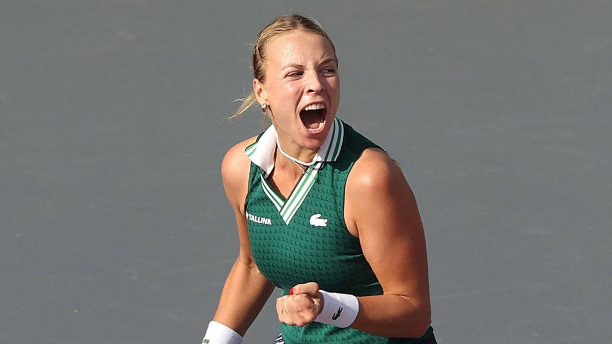 Triumph Moment Of Anett Kontaveit In Green Wallpaper