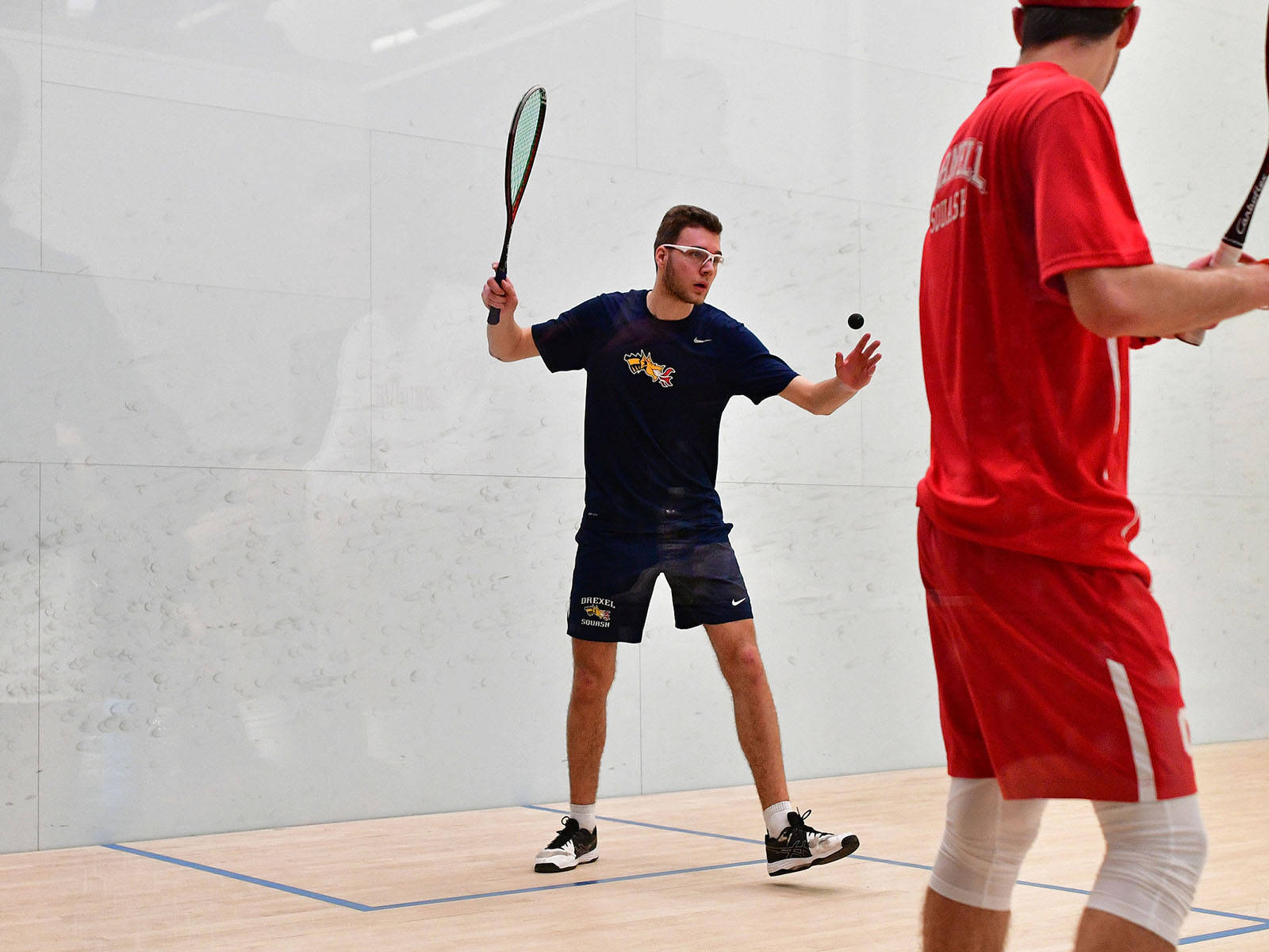 Two Boys In Squash Room Wallpaper