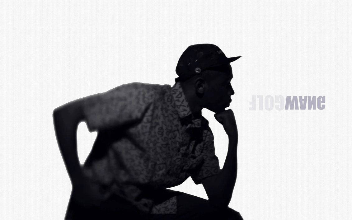 Tyler The Creator In Thoughtful Contemplation Wallpaper