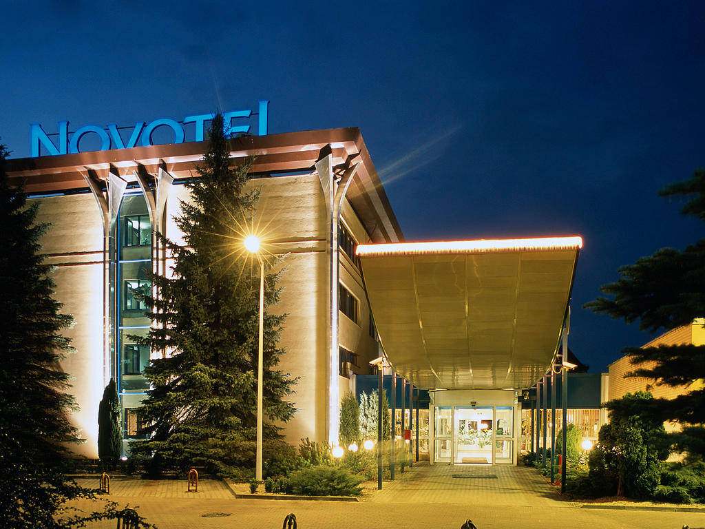 Unique Architecture Of Novotel Gdansk Centrum Near The Iconic Crooked House Wallpaper