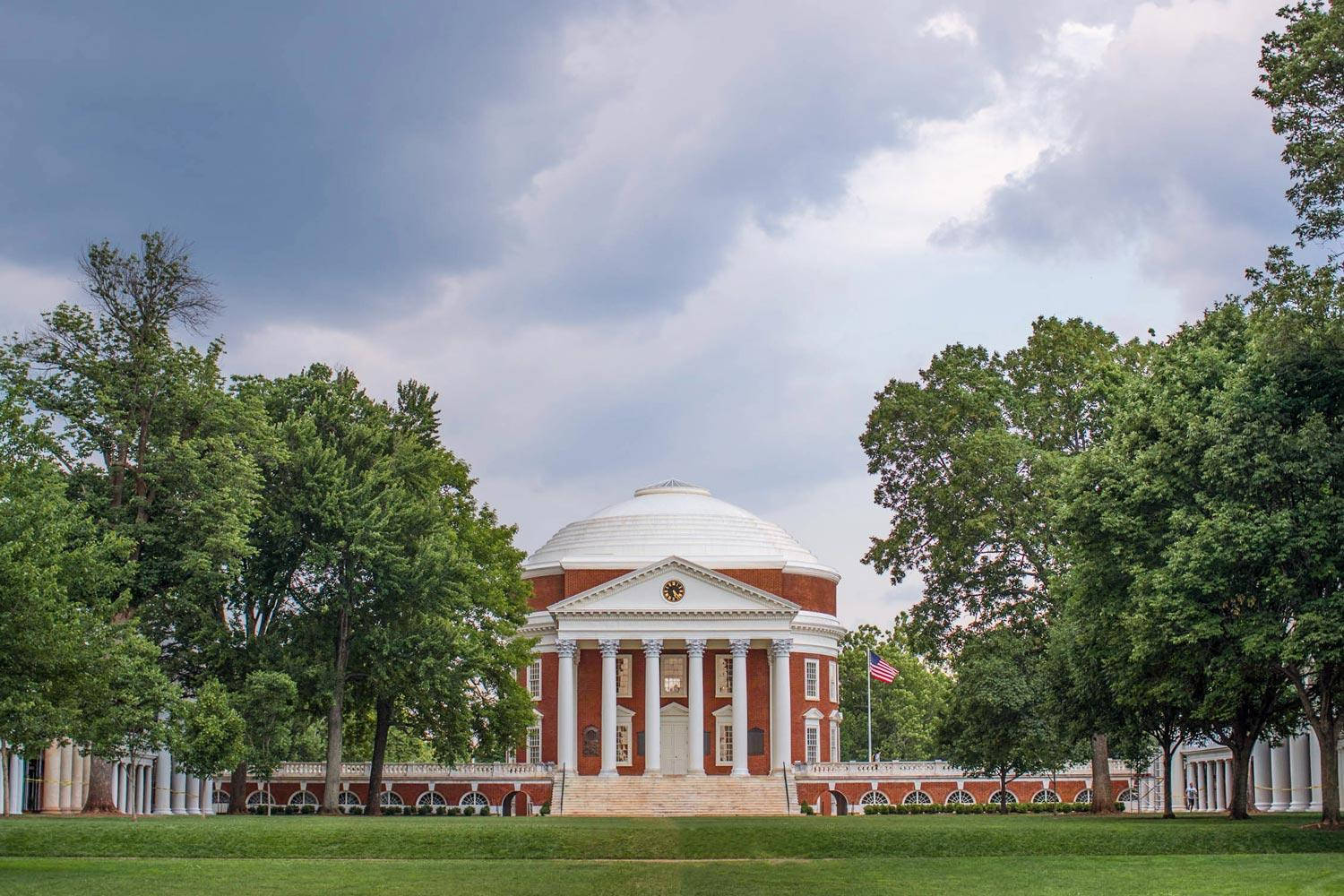 University Of Virginia's Historic Rotunda Under Cloudy Sky Wallpaper