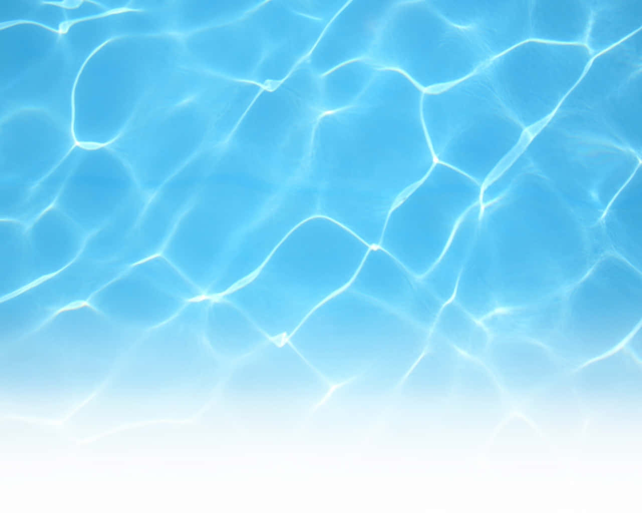 Unruffled Serenity Of A Crisp Blue Pool Wallpaper