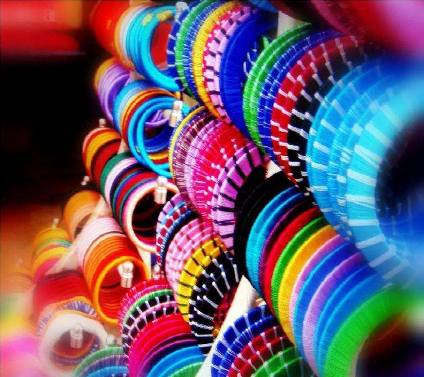 Variety Is The Spice Of Life - Here's An Assortment Of Colorful Bangles Wallpaper