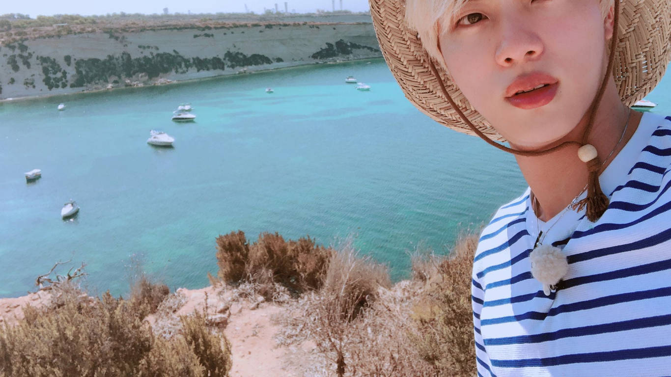 Versatile Artist Kim Seok Jin Candidly Captured In A Calming Scenery. Wallpaper