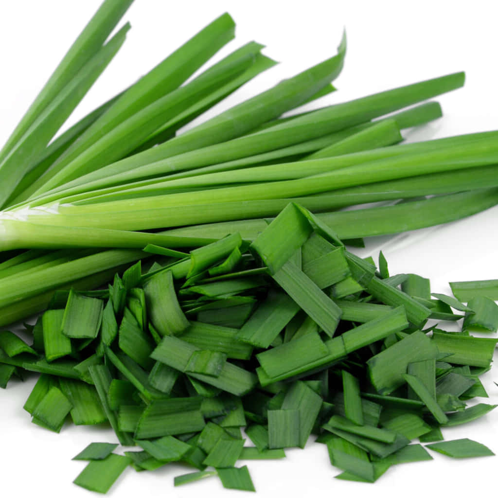 Vibrant And Fresh Green Chives Slices Wallpaper