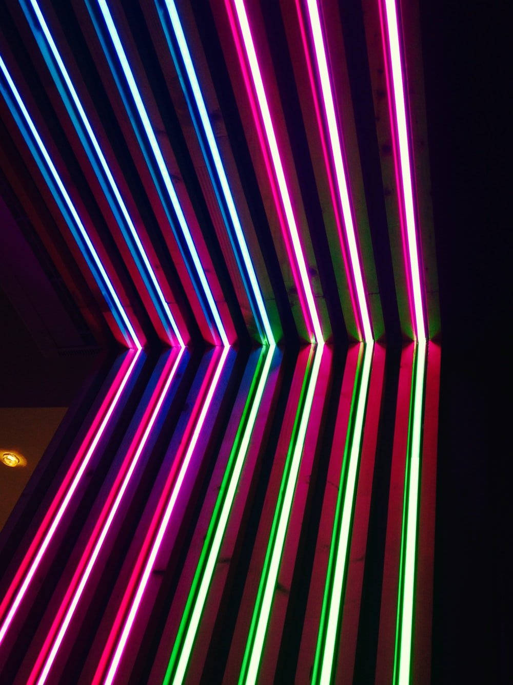 Vibrant Corner Illuminated By Neon Light Wallpaper