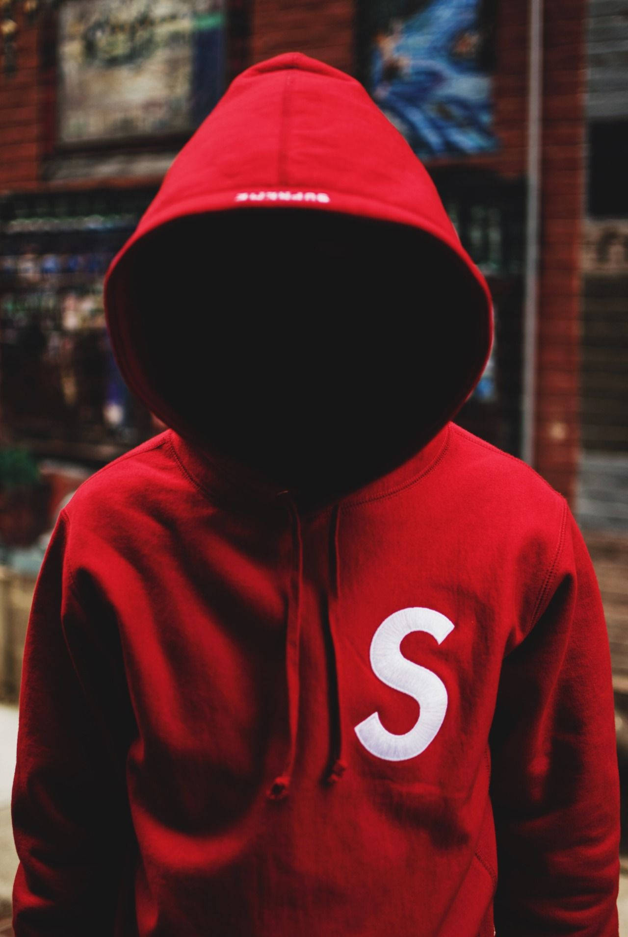 Vibrant Red Supreme Hoodie Wallpaper