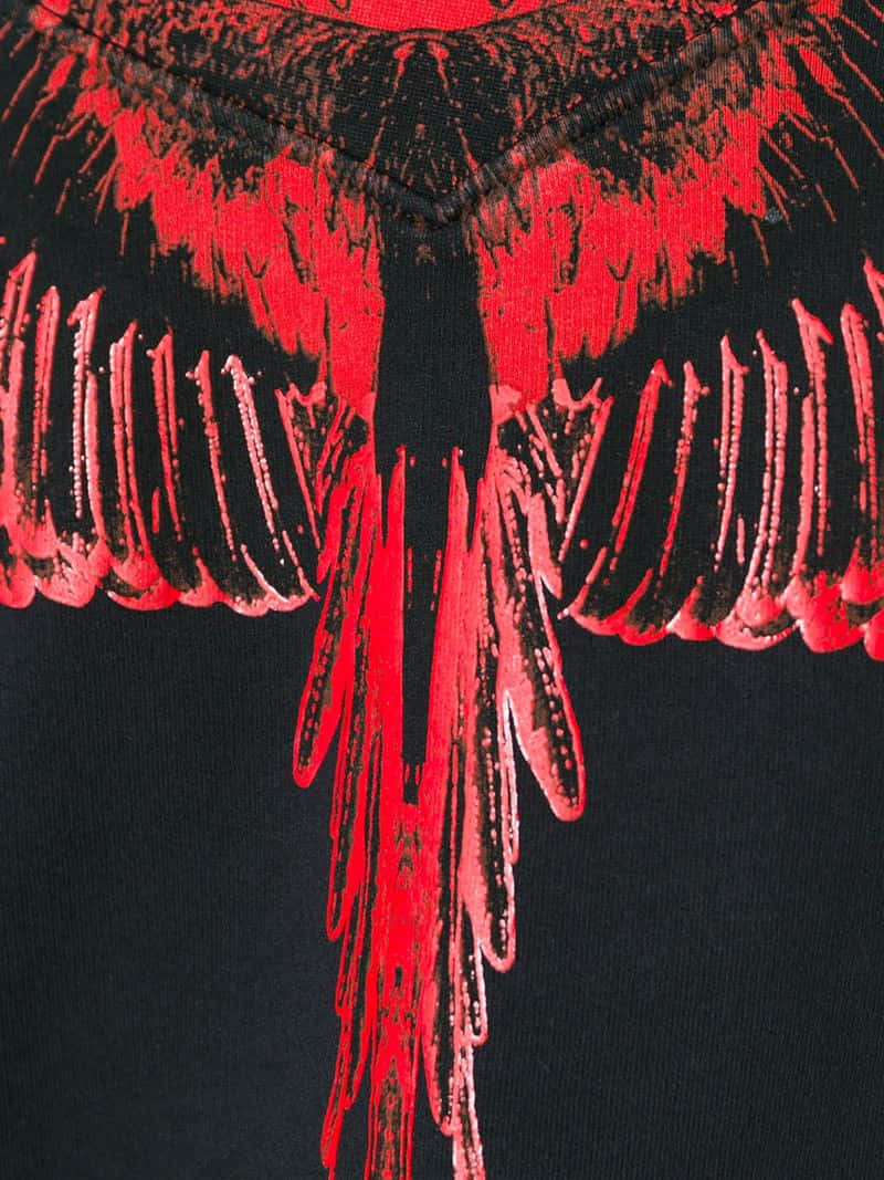 Vibrant Red Wings Design By Marcelo Burlon Wallpaper