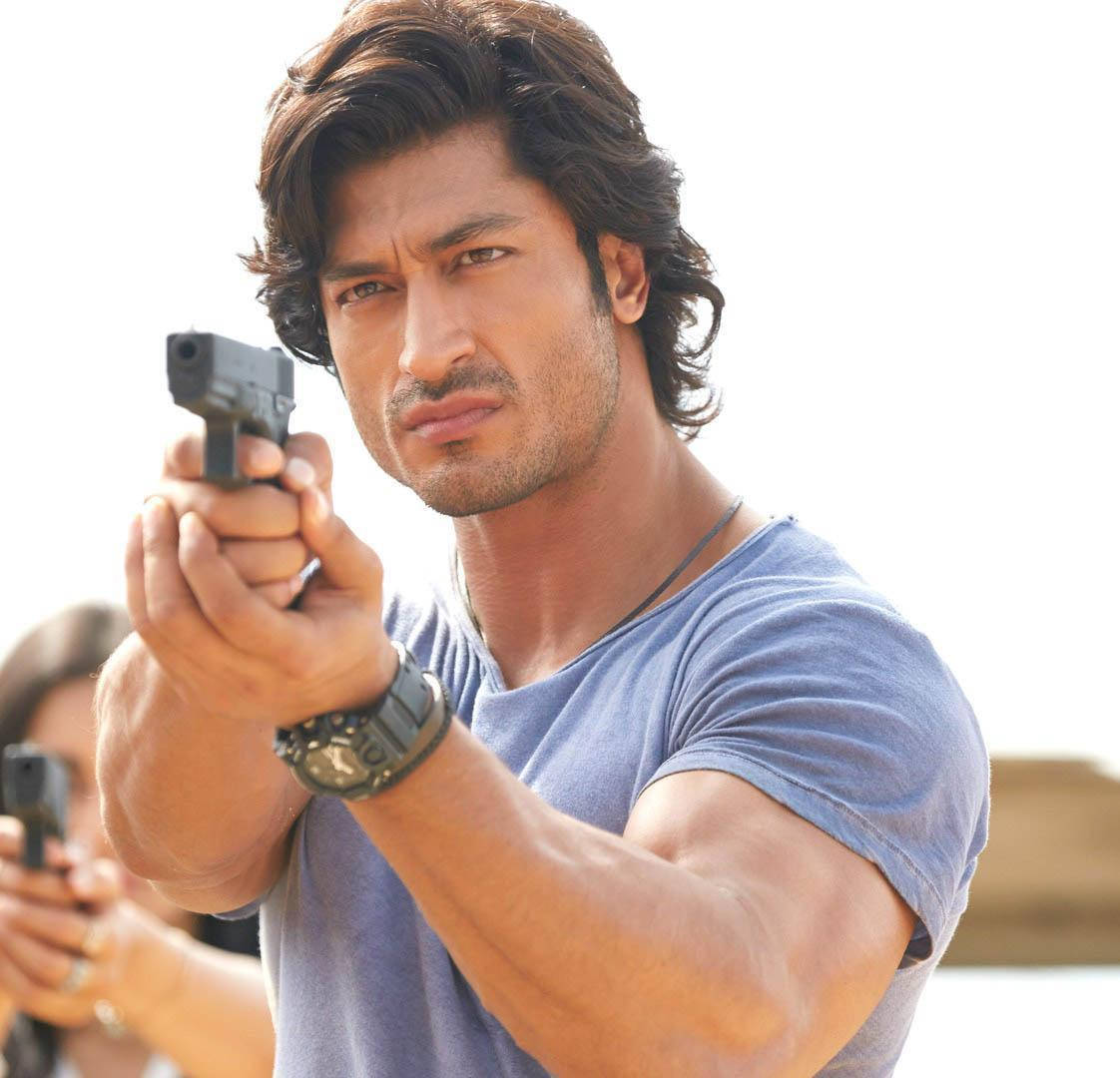 Vidyut Jamwal Holding Gun Wallpaper