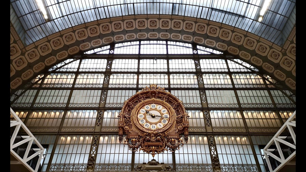 View Of The Famous Clock At Musée Dorsay Wallpaper