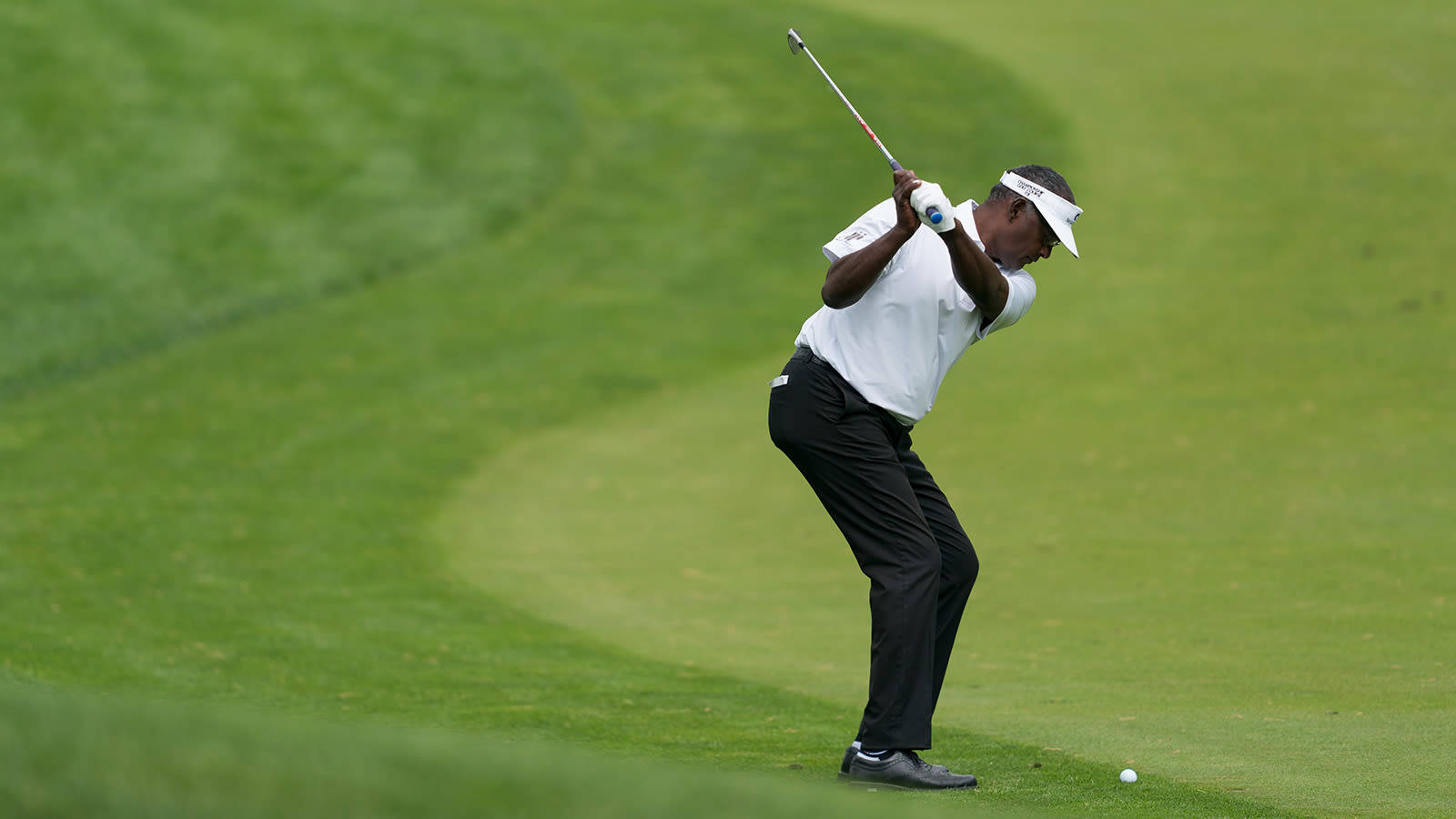 Vijay Singh Playing Golf On Course Wallpaper