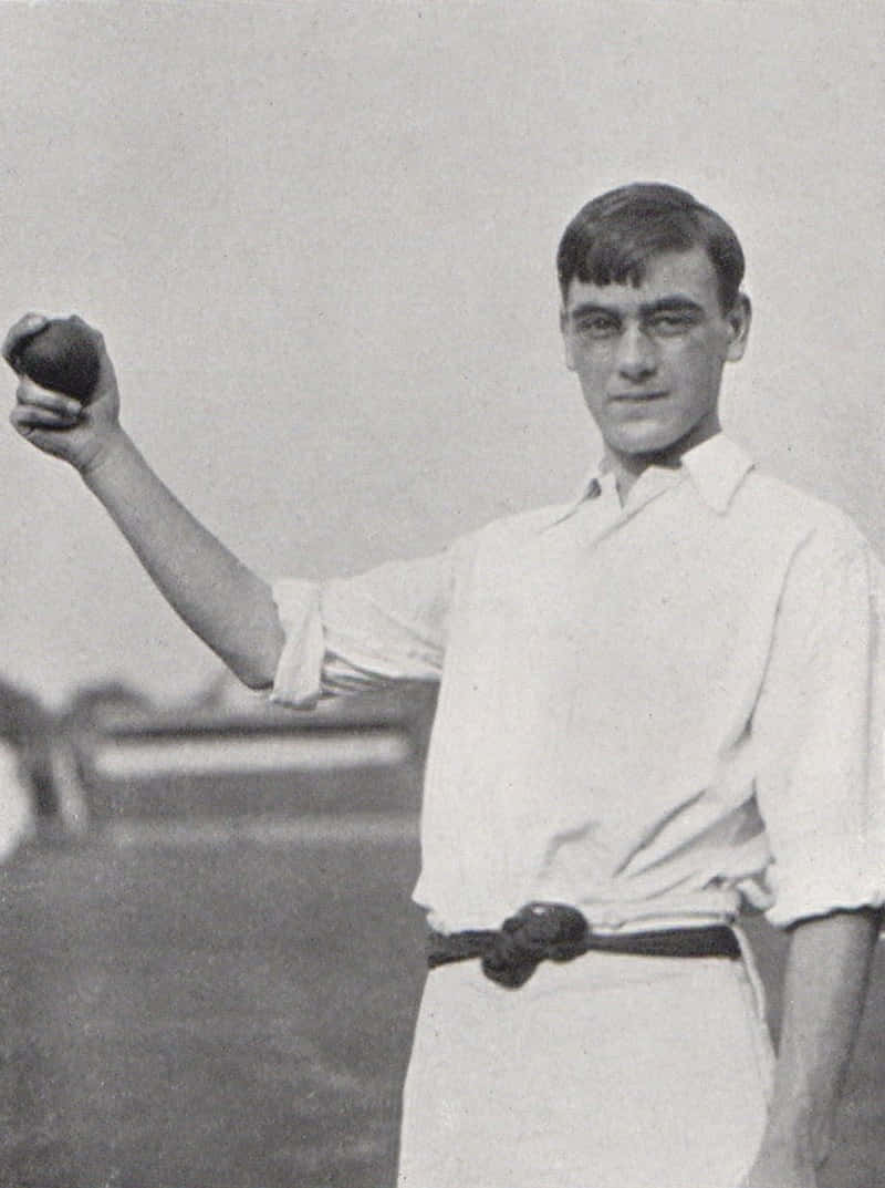 Vintage Cricket Bowler Pose Wallpaper