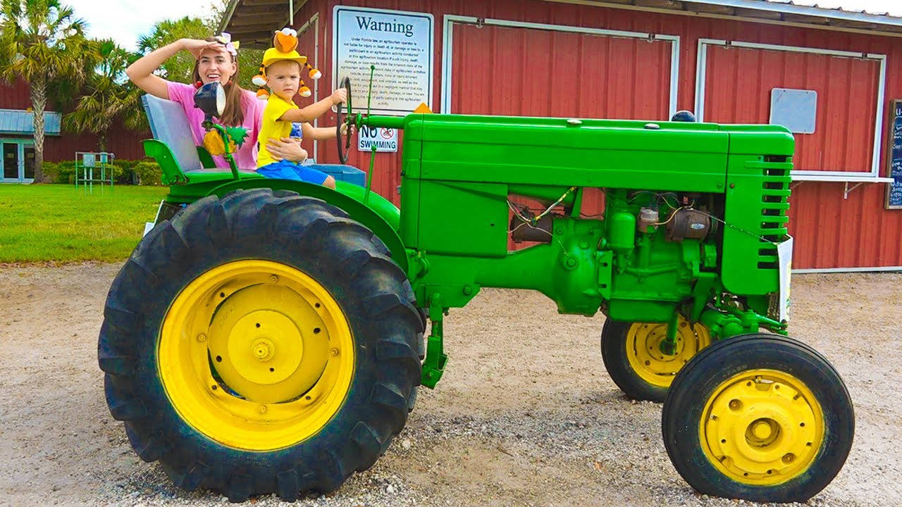 Vlad And Niki Chris And Mom In Tractor Wallpaper