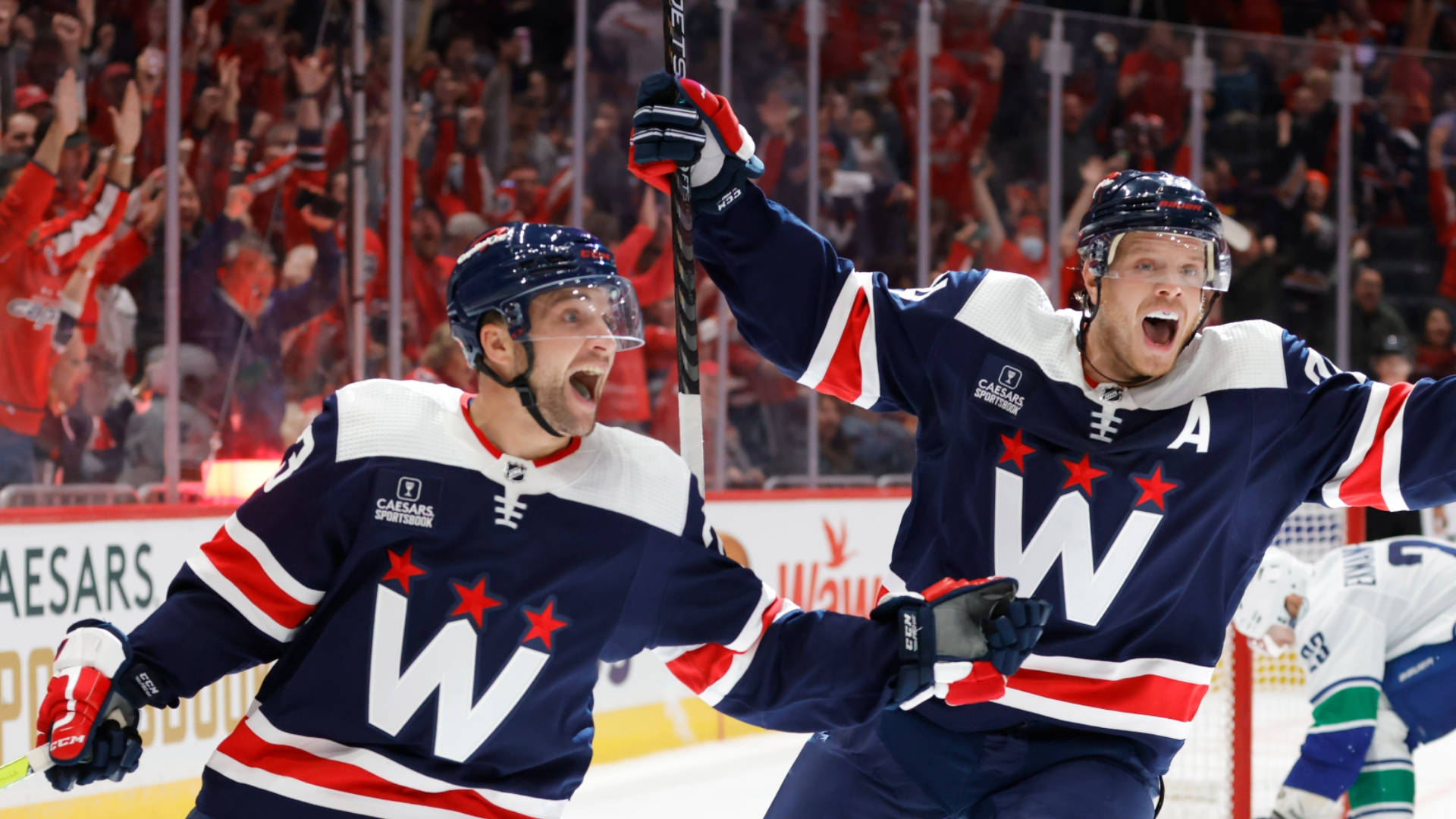 Washington Capitals John Carlson Victory Over Vancouver Canucks Wallpaper