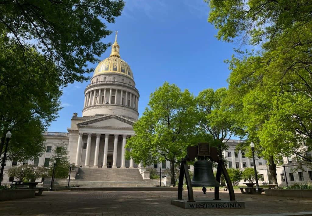 West Virginia And The State's Huge Bell At Its Capitol Building Wallpaper