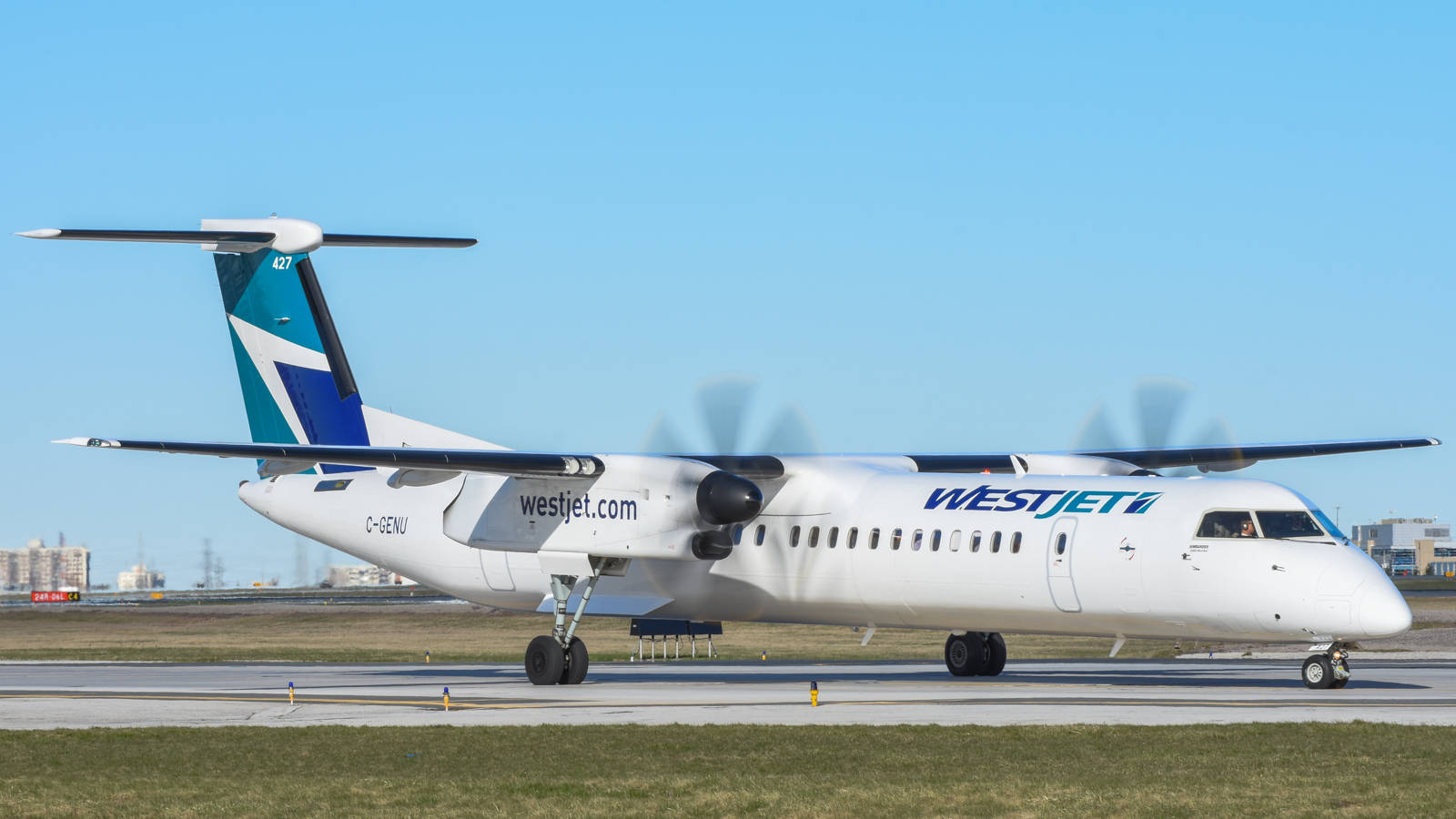 Westjet Airplane On Runway Wallpaper