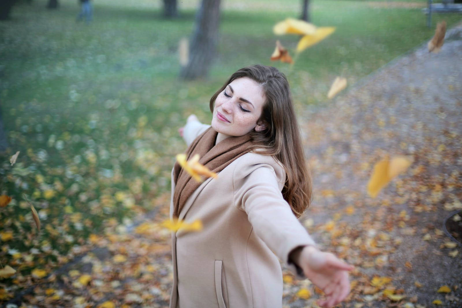 Woman In Park Enjoying Freedom Wallpaper