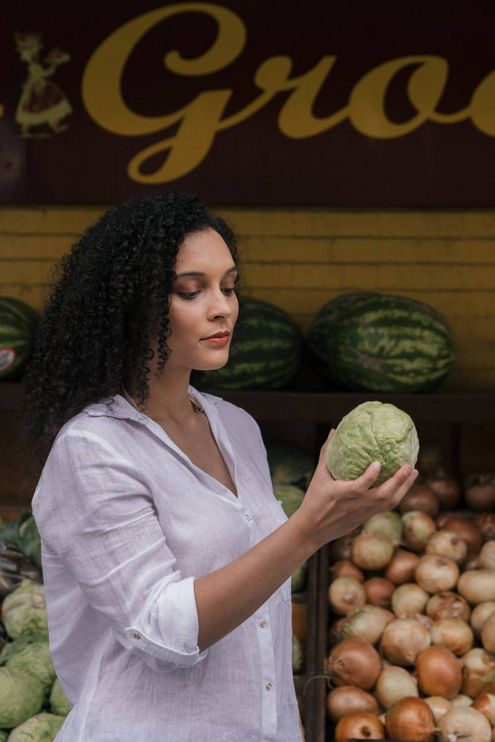 Woman Looking Cabbage Wallpaper